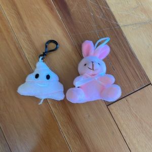 One pink poop one pink bunny keychains